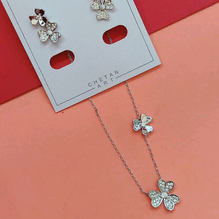 Silver CZ Flower Pendant With Dainty Flower In Chain